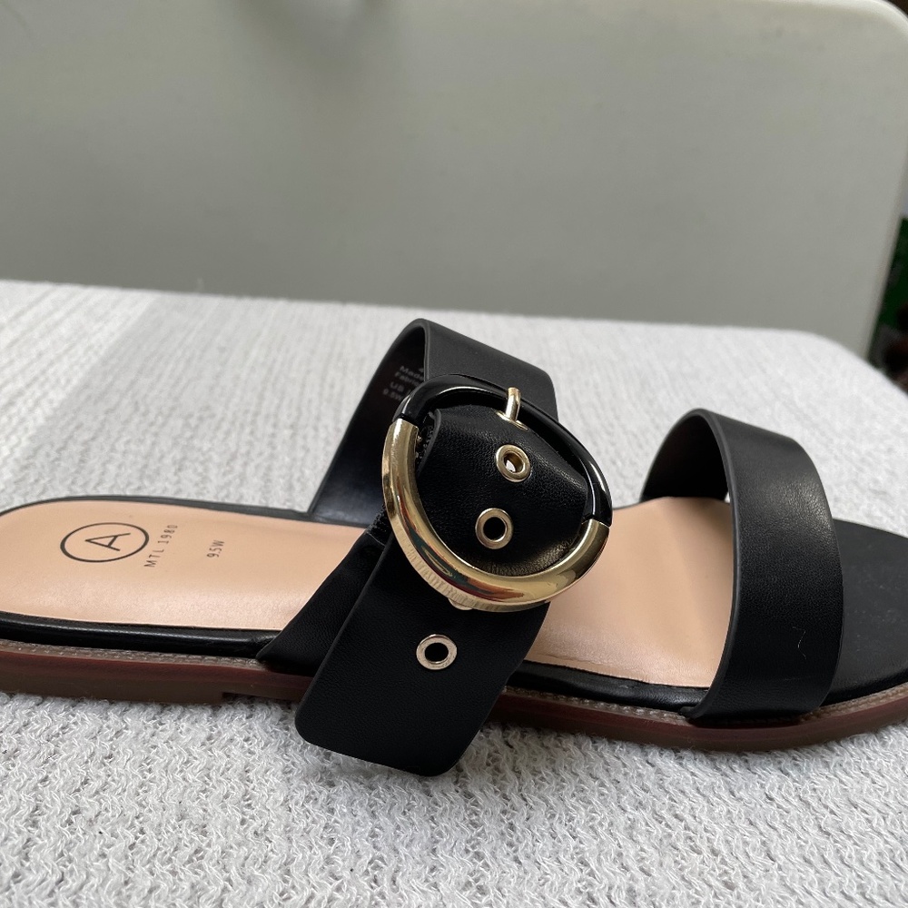 Brand New - ladies size 9.5 wide width black sandal with gold and black buckle